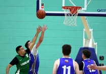 Wolves edge past Cavs in thriller as basketball resumes