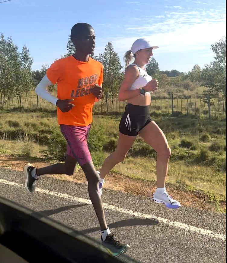 Isle of Man athlete Christa Cain on a training run in Iten, Kenya alongside local pacemaker Philemon