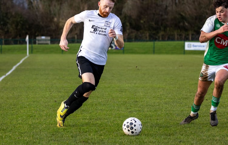 Dan Simpson (left) scored twice to help Corinthians edge past Laxey by the odd goal in five during a hard-fought contest at Ballafletcher last weekend (Photo: Gary Weightman)
