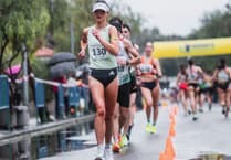 Erika 'rains' in Spain as floods hit 10km race