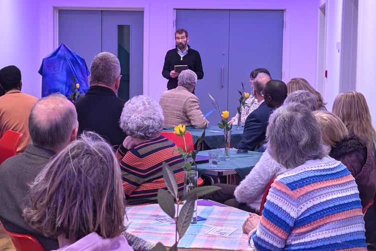 Project manager Juan Clarke addresses those gathered at the launch of the community hub