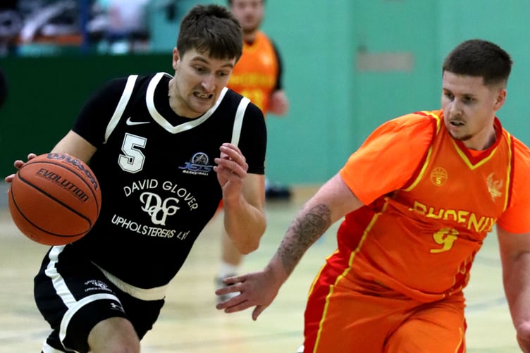 DGU Jets' Jake Glover pushes the fast break as Southern Phoenix's Connor Moughtin chases on defence (Photo: Ben Campbell)