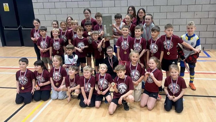 The Western AC team celebrate winning the Jude’s Sportshall junior athletics competition at the Roundhouse last weekend (Photo: Claire Turner)