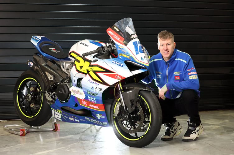 Ian Hutchinson alongside the Burrows Engineering/RK Racing Ducati Panigale