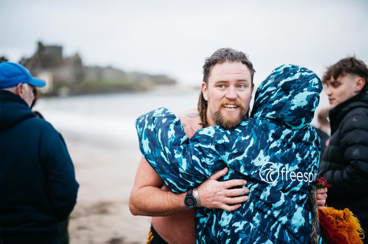 Sealed with a hug! (Photo - Liam Gilman Photography)