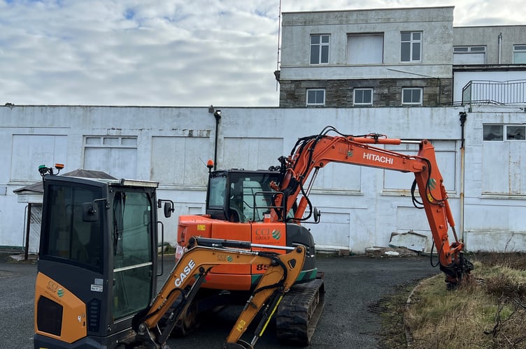 Contractor's equipment ready to begin demolition
