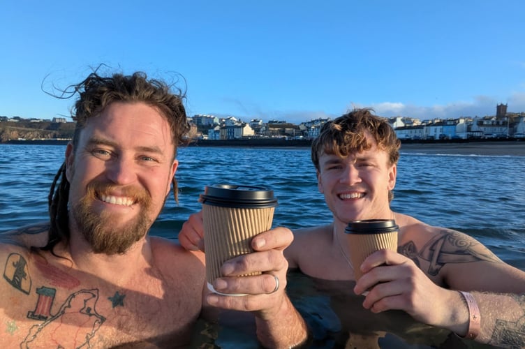 Juan with his son Harvey in Peel Bay