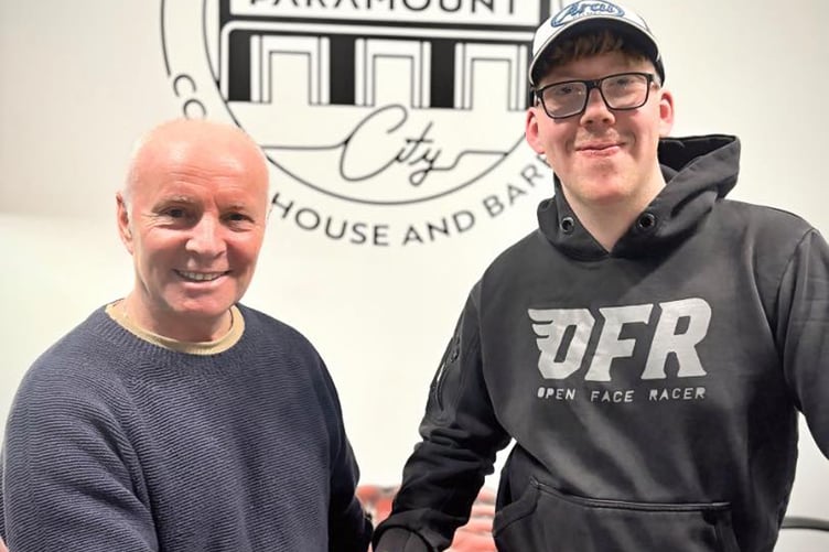 Manx racer Illiam Quayle pictured with TT legend and Team ILR principal Ian Lougher after signing with the team for the 2026 season
