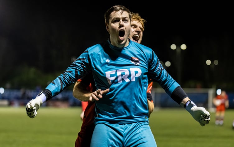 FC Isle of Man goalkeeper Adam Killey and Callum Sherry celebrate wildly after the Ravens number one scored a dramatic 94th-minute equaliser against Ramsbottom United at the Bowl on Saturday evening (Photo: Gary Weightman)