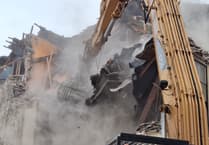 Watch as former Douglas shop and takeaway site bites the dust