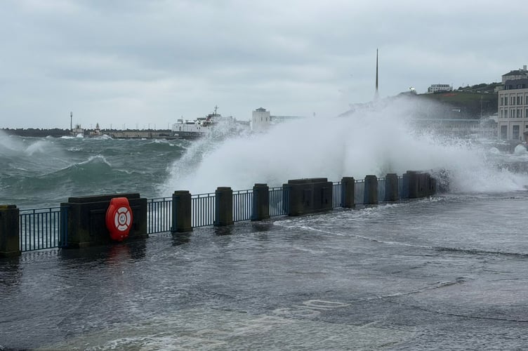 Waves crashing onto Douglas Promenade