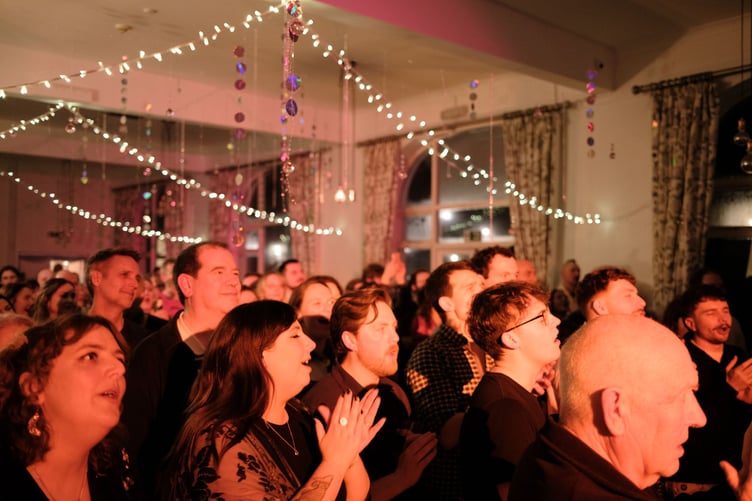 The crowd enjoying the music