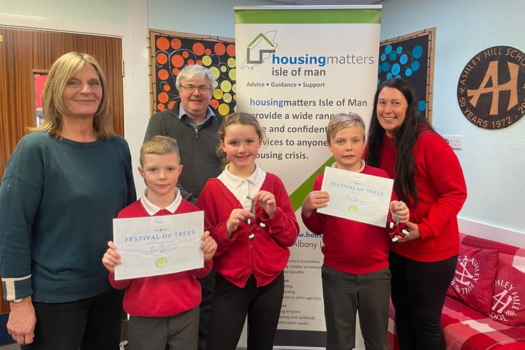 Ashley Hill School's Claire Ashton and Ellie Marshall with Karl Brew from Housing Matters and pupils Elliot, Poppy and Bohan