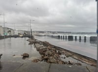 Wall collapses as waves force car park to shut