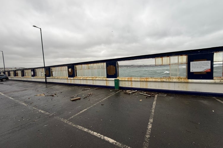 Windows at the barrier at the Sea Terminal car park have been blown out due to huge waves and strong winds