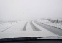 Snow shuts Mountain Road