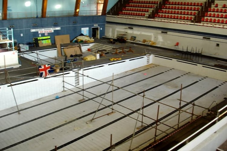 Looking down at the empty Aquadrome pools in preparation for demolition