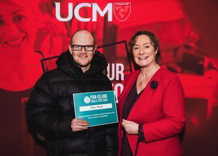 Motor Vehicle winner Kieran Halsall with Education Minister Daphne Caine