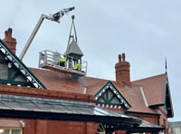 Watch as railway station belfry is craned off roof