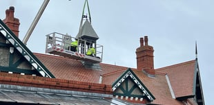 Watch as railway station belfry is craned off roof