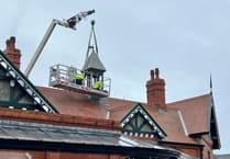 Watch as railway station belfry is craned off roof