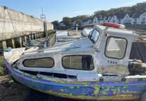 Department of Infrastructure tackles derelict boats to protect harbours