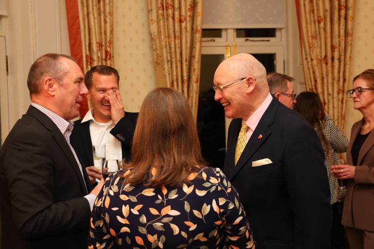 The Lieutenant Governor Sir John Lorimer engages in conversation