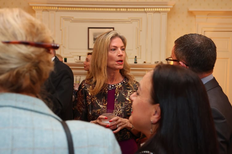 Jennifer speaking to guests