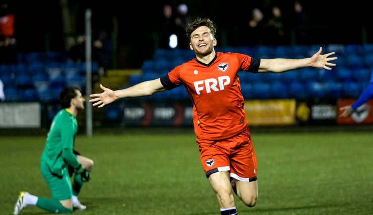 Jacob Crook wheels away in celebration after scoring the opening goal for FC Isle of Man on Saturday evening at the Bowl (Photo: Hannah McHugh)