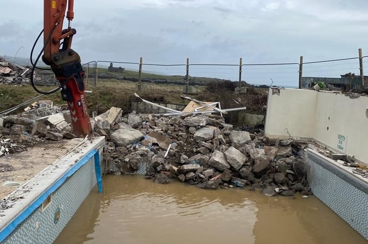 The hotel's pool is reduced to rubble