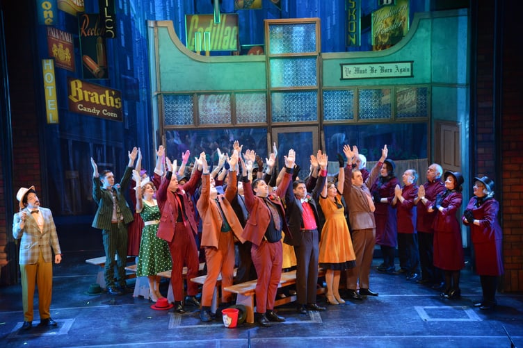 The classic musical comedy is set in 1950s New York City