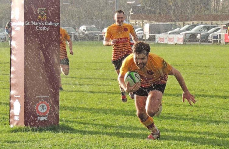 Matty Wood scores for Douglas RUFC against Waterloo during November's meeting between the two sides (Photo: Tony Wilson-Spratt)