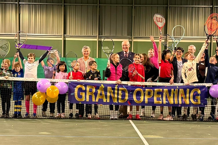 Some of the junior members of Albany Lawn Tennis Club with His Excellency Lieutenant Governor Sir John Lorimer and Lady Lorimer at the official reopening of the indoor court