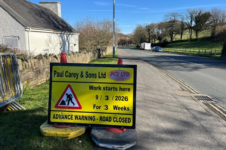 The road closure notice sign in place outside White Hoe Industrial Estate