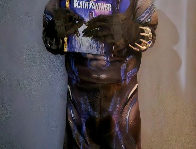 Mason aged 6 as Black Panther from the Marvel series of little golden books