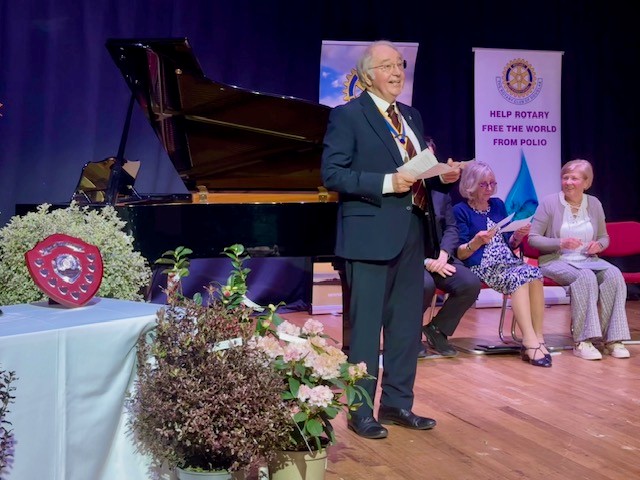 President of the Rotary Club of Douglas Ivan Bratty provides a speech