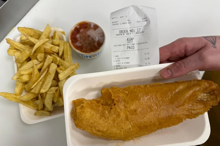 Hake, pictured with some chips and beans.