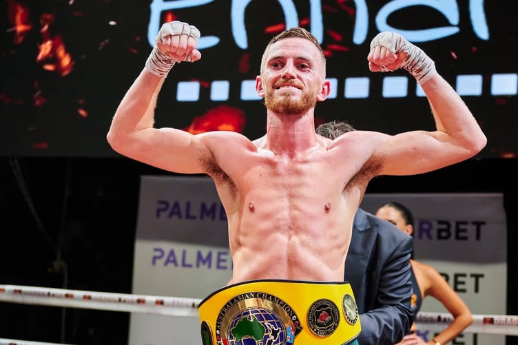 Sam Rennie celebrates after victory his latest title victory in Australia on Friday evening (Photo: Dragon Fire Boxing)