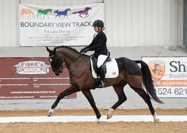 Helen Squires and Leo in action at Myerscough where they qualified for the NAF Five Star Winter Championships (Photo: Lottie Christian Photography)