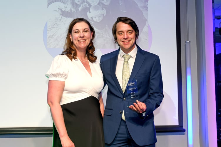 Pete Corkhill, winner of the EDI Champion Award. Award presented by Helen Ashley, Executive Director for people and workforce at Manx Care