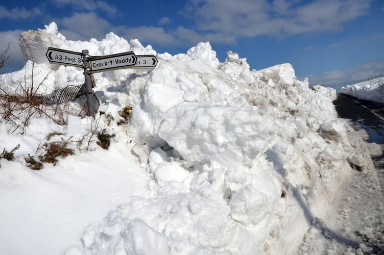 Banked snow around the Peel to Kirk Michael coast road