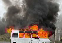 Watch as crews battle camper van fire near airport industrial estate