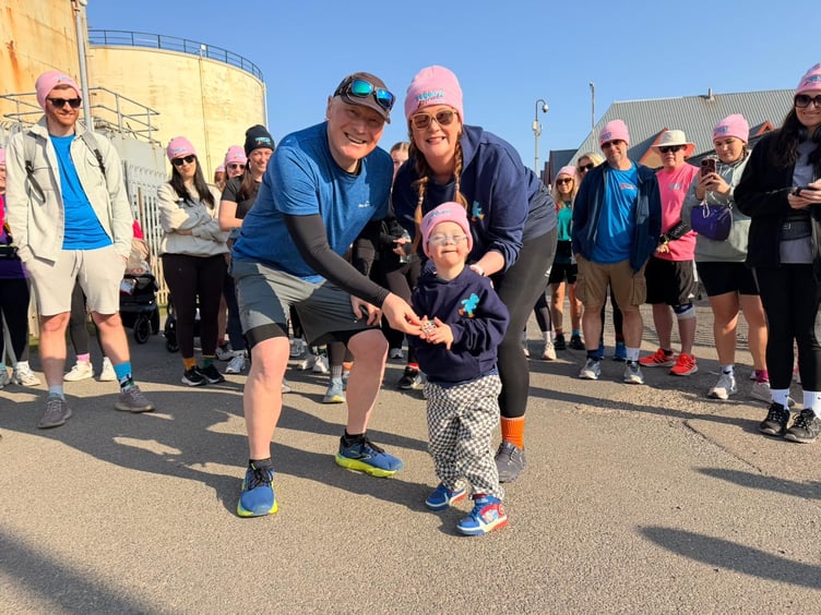 The Lieutenant Governor Sir John Lorimer with Teddy during the walk