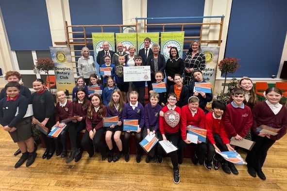 Pupils from all the participating schools in the junior public speaking competition alongside representatives from Douglas Rotary Club and special guests