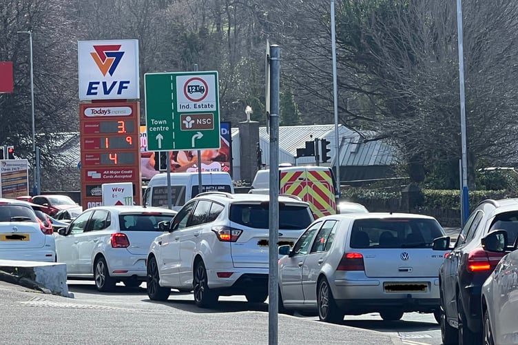 Motorists queue for fuel at the EVF garage on Peel Road