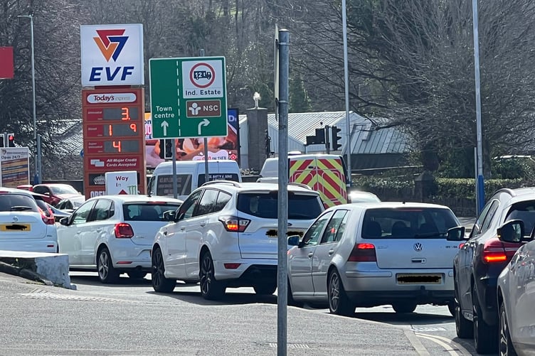 Motorists queue for fuel at the EVF garage on Peel Road