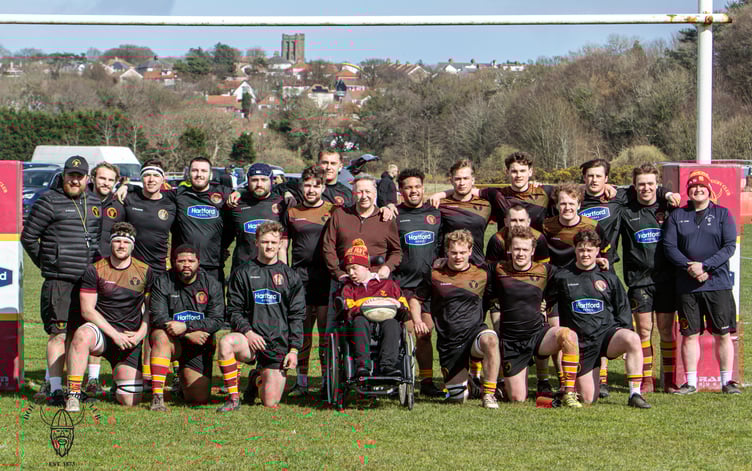 The Wrigley family have supported Douglas Rugby Club for many years, with Iain and Sandra attending pre-match functions. Son Owen has a rare genetic condition and the teams applauded him as he carried the match ball on for the Port-e-Chee clash between Douglas and West Park St Helens at the weekend