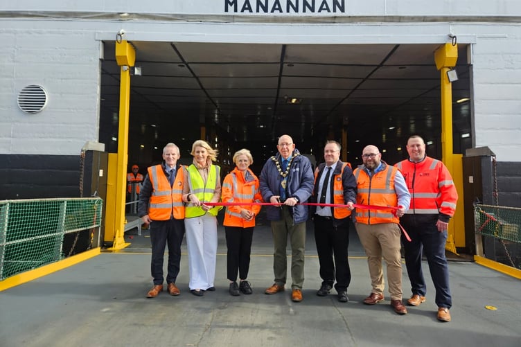 Mayor of Mid and East Antrim, Jackson Minford, cuts the ribbon on the Steam Packet's maiden voyage to Larne