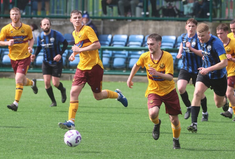 Action from the GH Corlett Woods Cup final between Marown v RYCOB (Photo: Paul Hatton)