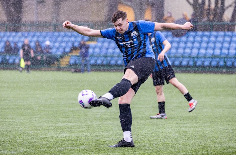 RYCOB in action against Marown in the GH Corlett Woods Cup final (Photo: Gary Weightman)